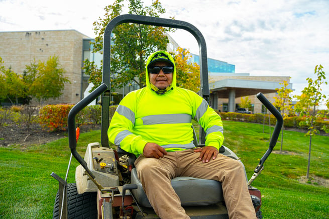 man on mower