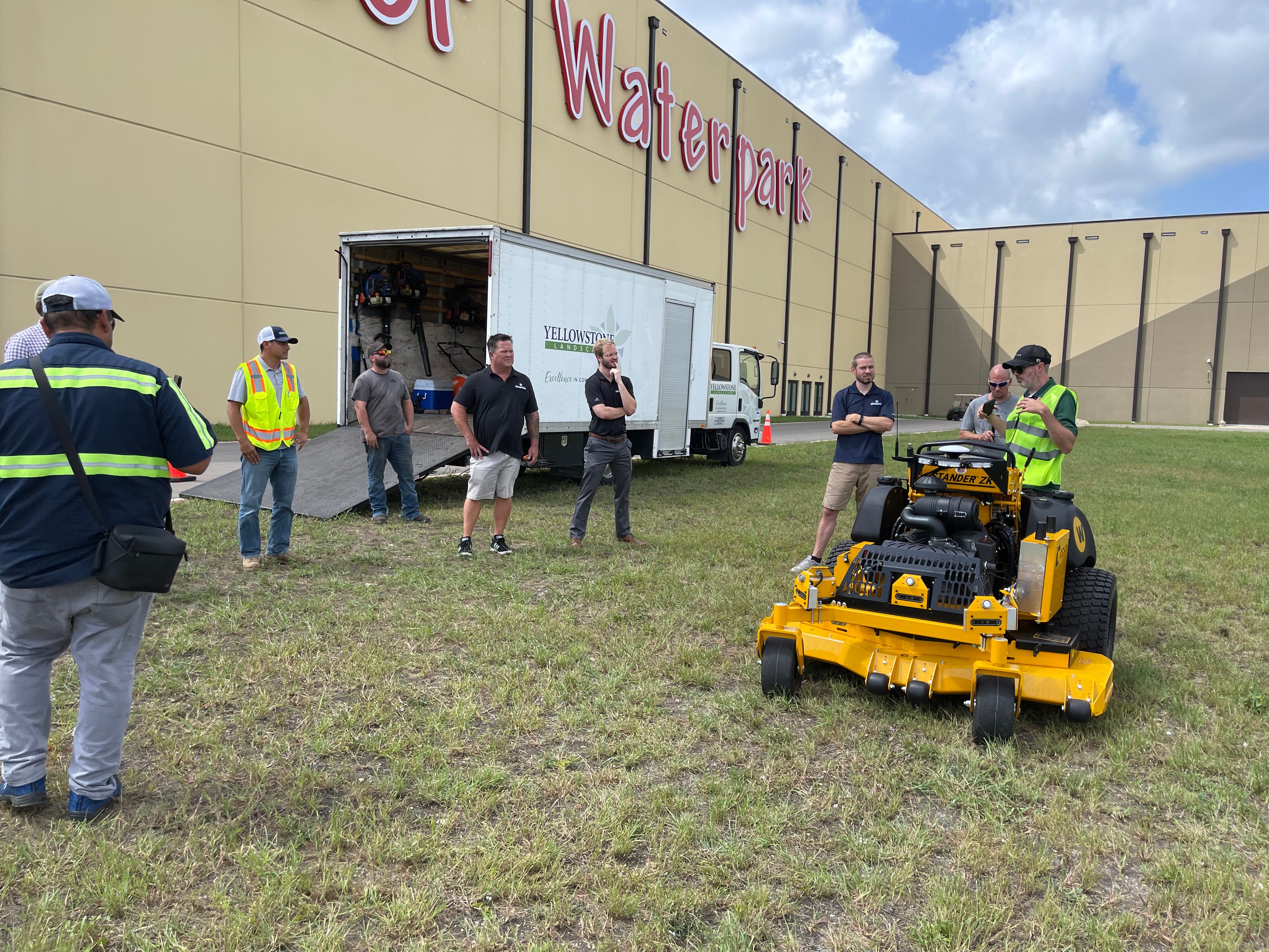 Crew testing and training on an electric mower