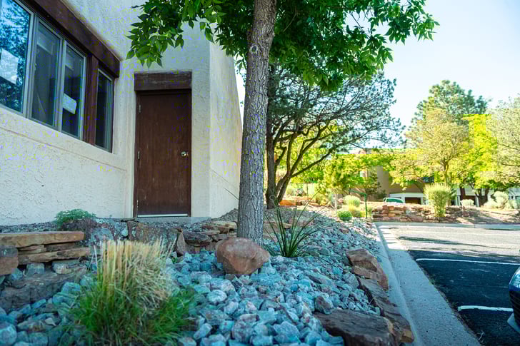river rock in landscaping bed