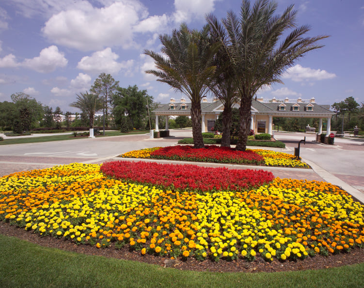 commercial property entrance with flowers