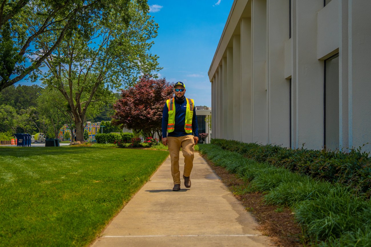 Landscape professional on walkway