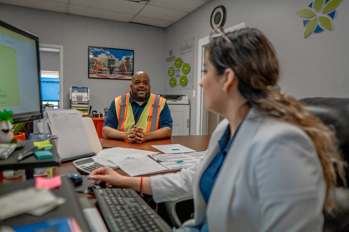 Commercial Landscaping operations manager and office manager meeting 