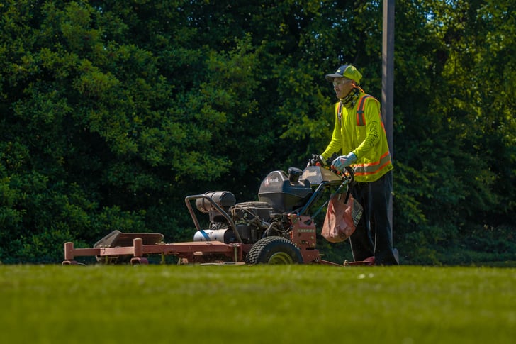 Commercial landscaping crew mowing 2