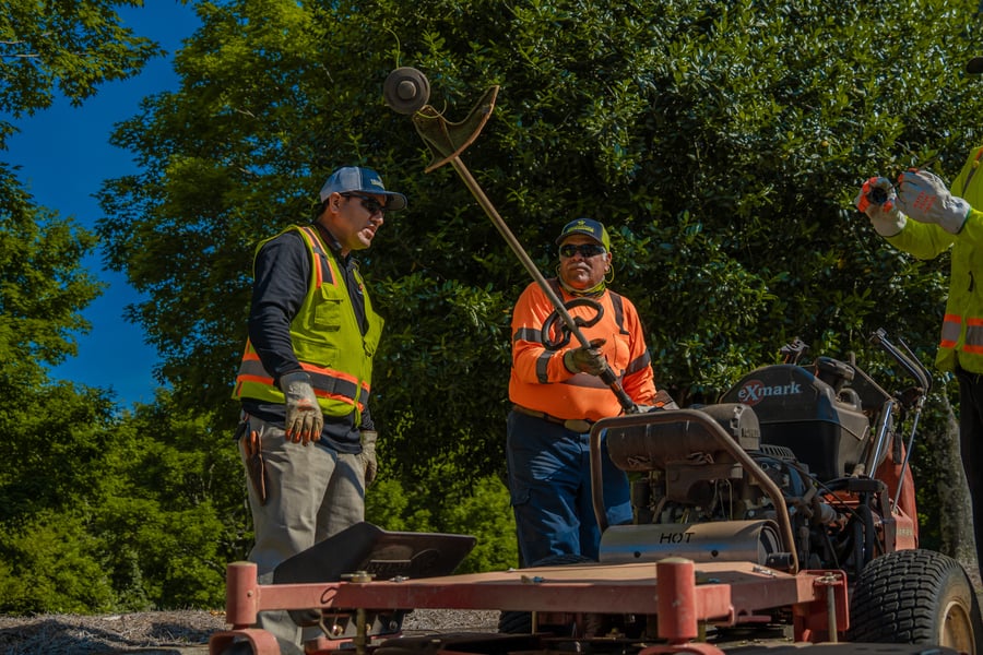 Commercial landscaping safety crew meeting equipment