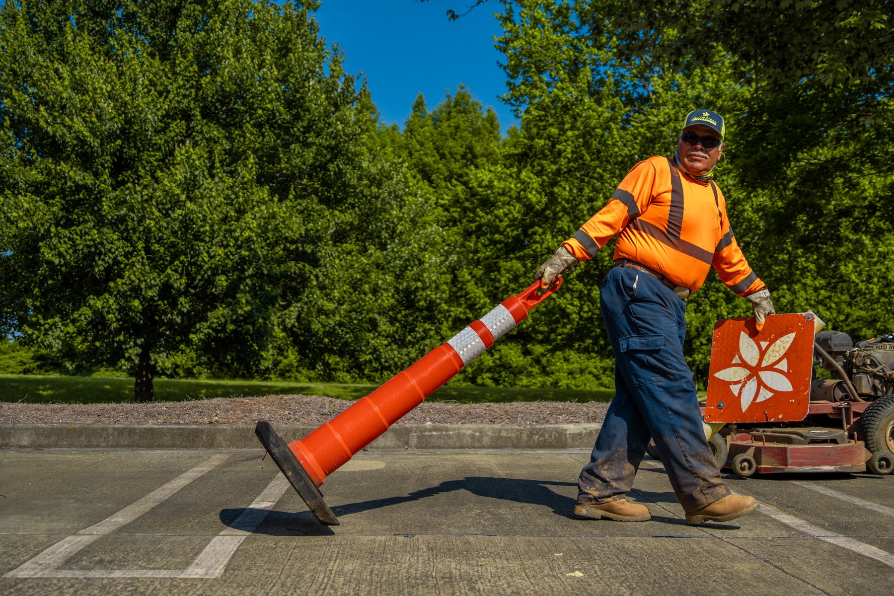 Landscape crew placing safety cones