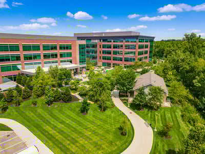 Green turf and trees in front of office. Commercial Landscaping Company in Ohio