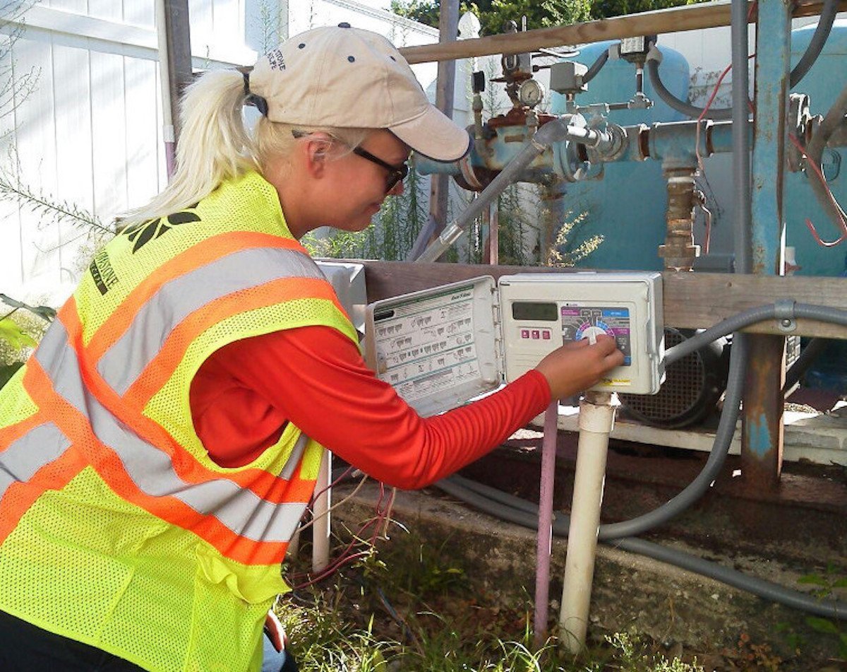 yellowstone employee adjusting irrigation