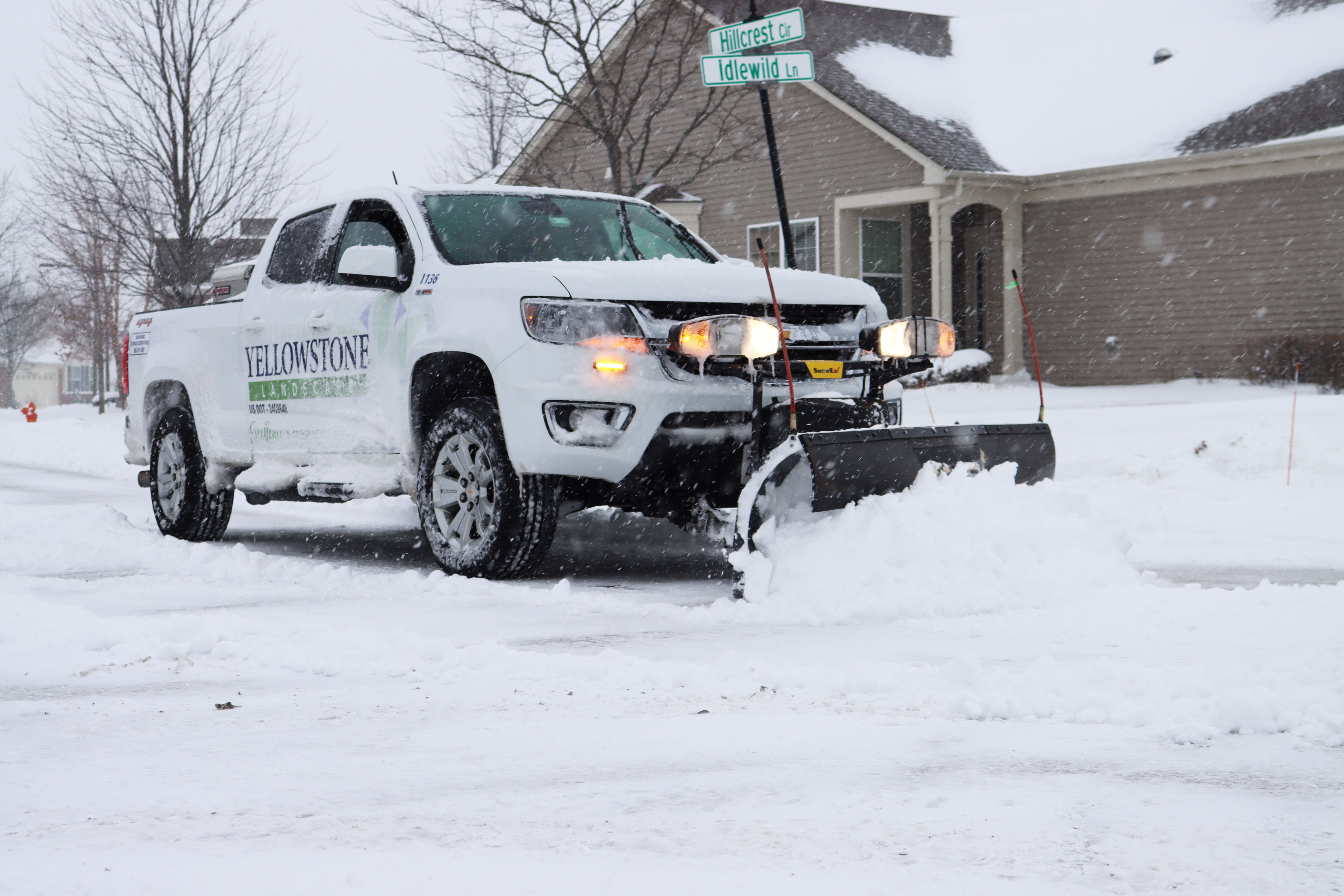Truck Plowing Snow Street