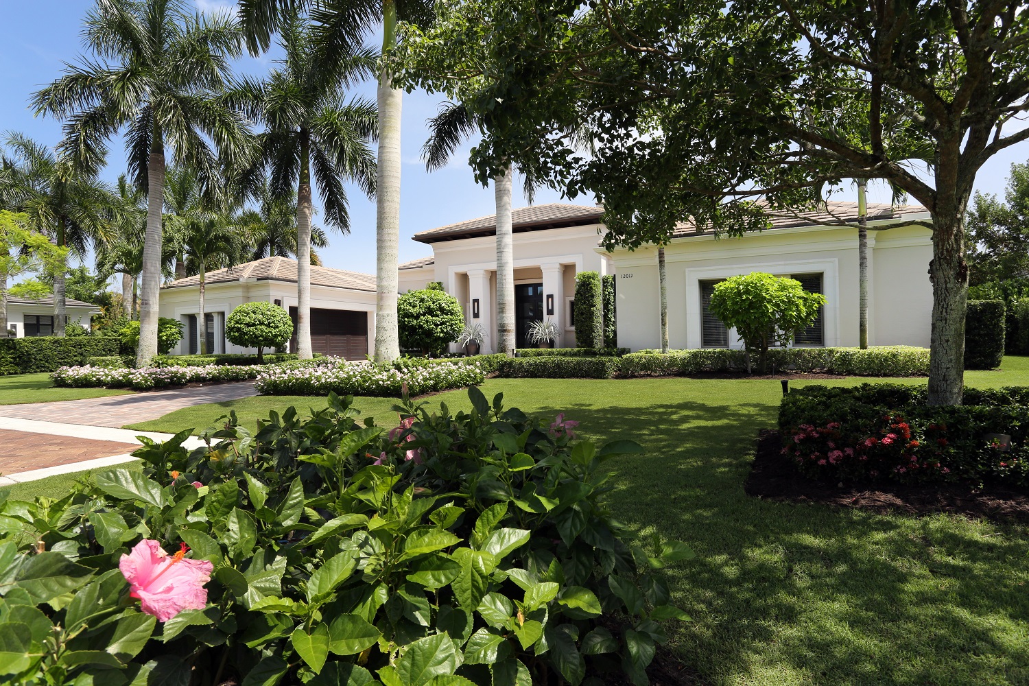 HOA manicured landscaped entrance