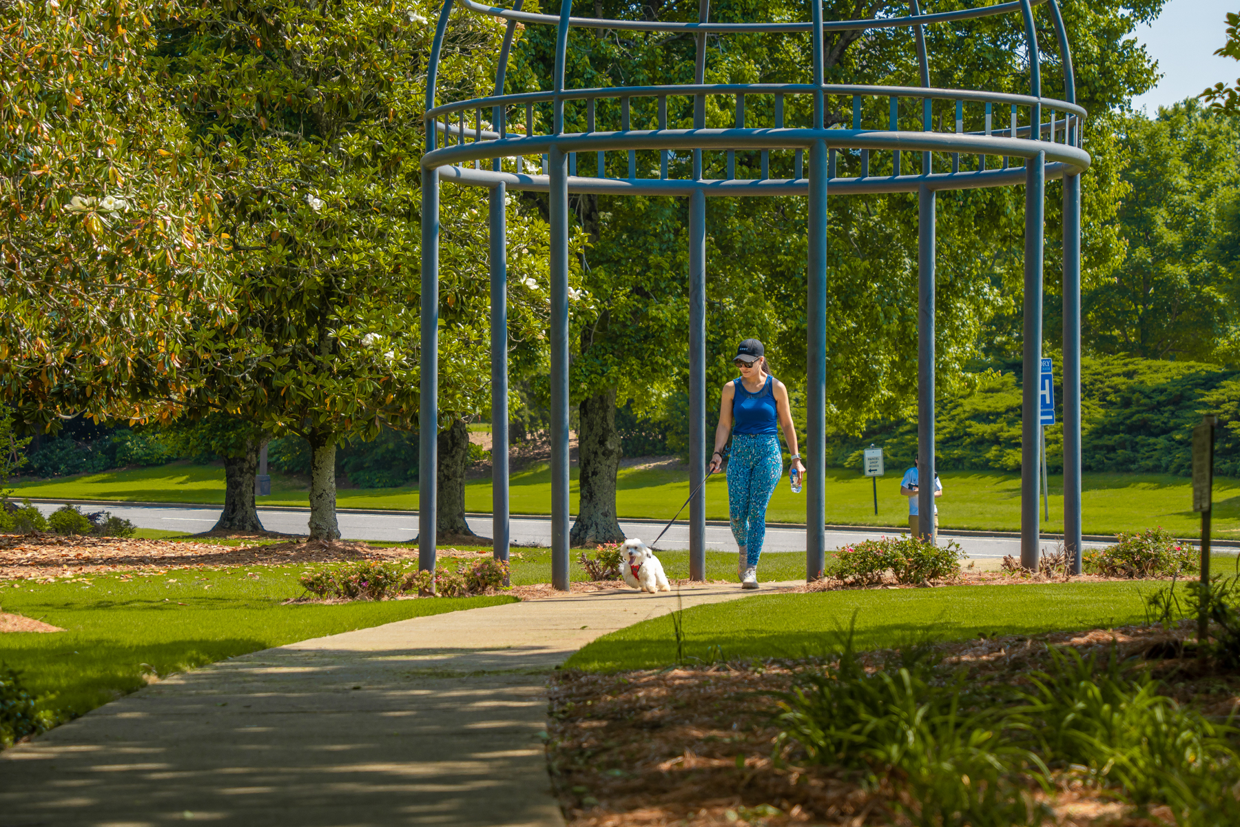 woman walking dog on commercial property